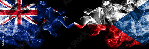 New Zealand vs Czech Republic smoky mystic flags placed side by side. Thick colored silky abstract smoke flags