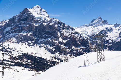 Snow mountain and Gondola lift with tower from Grindelwald to First peak  ,  Switzerland © mathisa