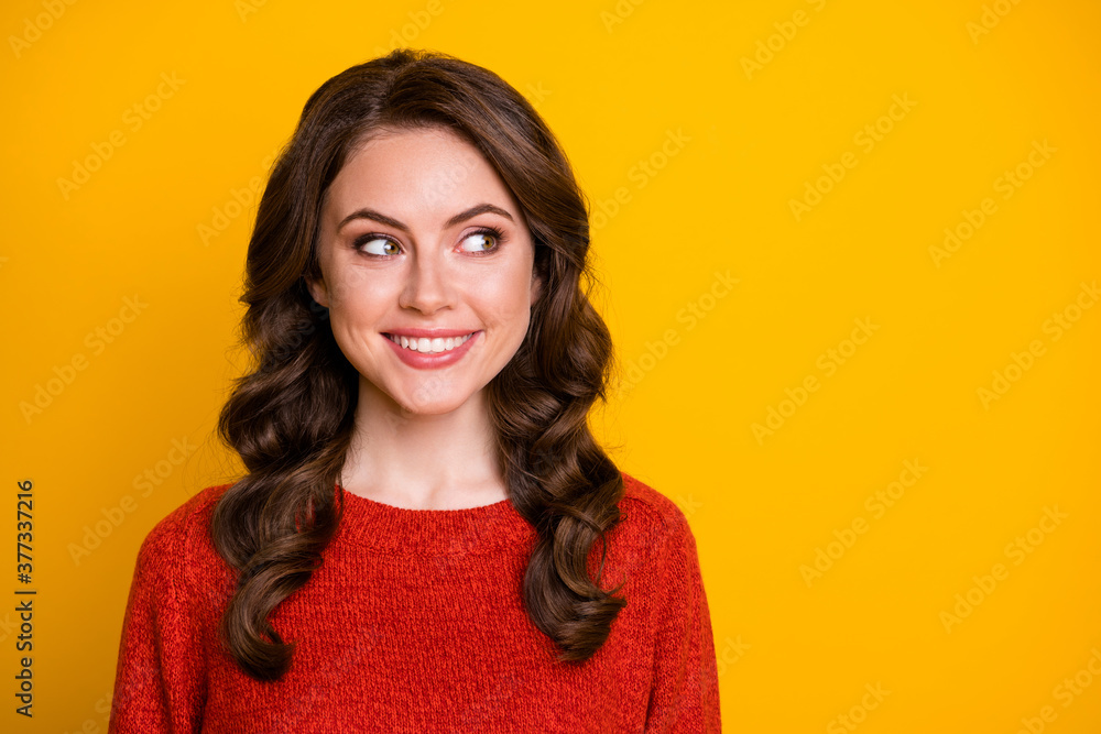 Fototapeta premium Portrait of excited interested girl enjoy winter rest relax look copyspace wear sweater isolated over bright color background