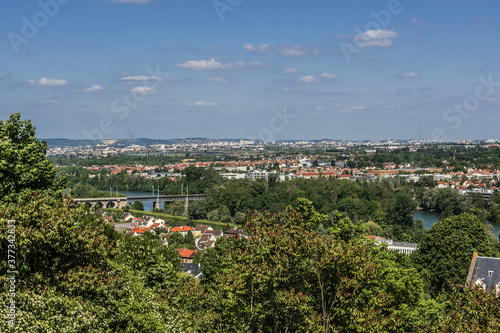 Beautiful view of valley of Seine River and panorama of Paris on backgrounds from lookout near Chateau de Saint-Germain-en-Laye in city Saint-Germain-en-Laye (13 miles west of Paris), France. © dbrnjhrj