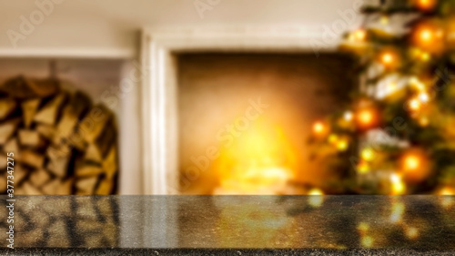 Table background of free space and christmas tree with fireplace 