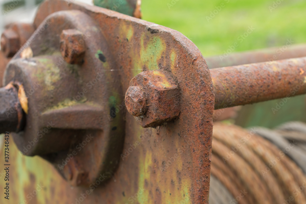 Detail of hand-operated winch on boating harbour. Detail of hand-operated winch on boating harbour.