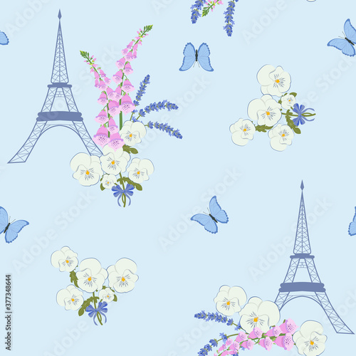 Seamless pattern with Eiffel tower,pansies, lavender and butterflies on a blue background.
