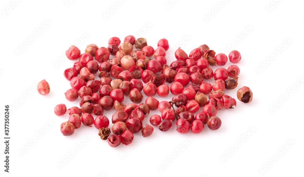 dried pink peppers isolated on white dried pink peppers isolated on white