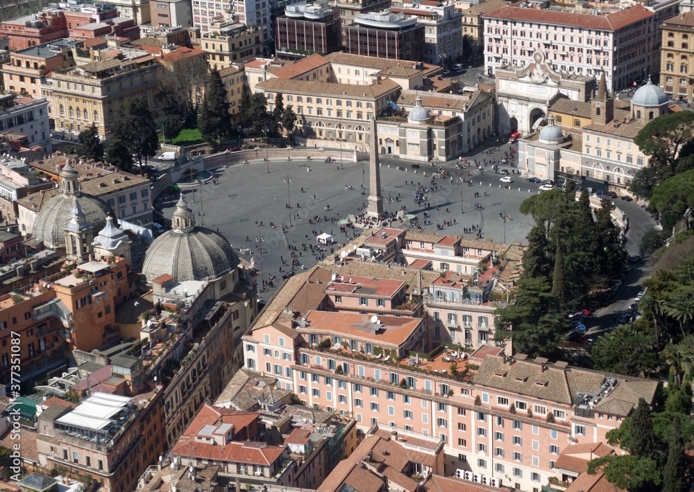 Aerial view of a piazza Popolo with monument and church in Rome Italy