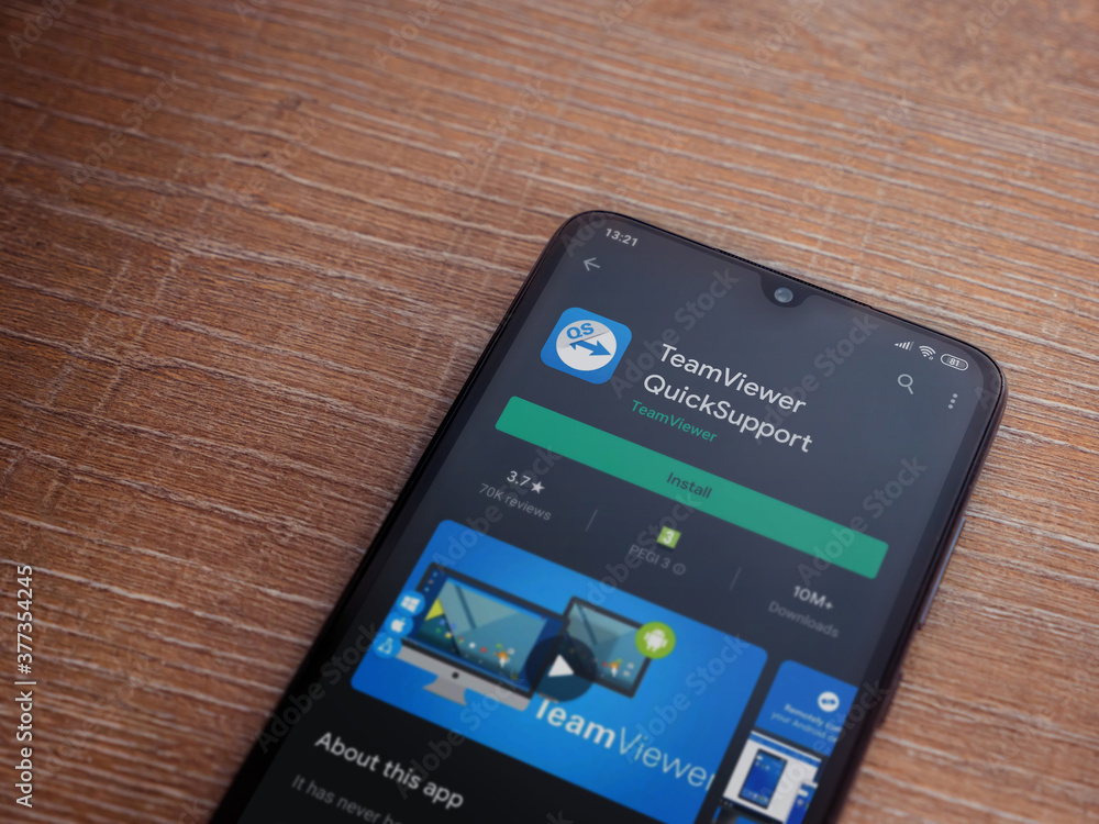 TeamViewer QuickSupport app play store page on the display of a black