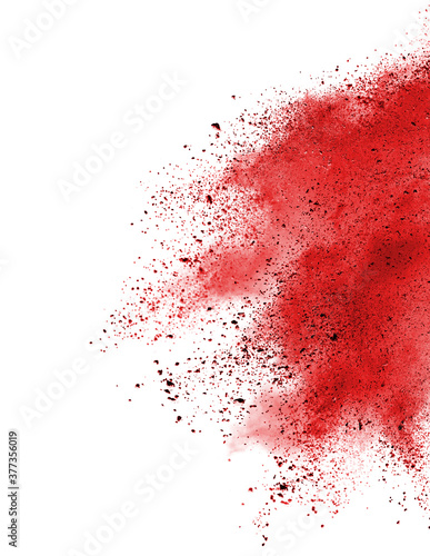 Red powder explosion on white background. Paint Holi.