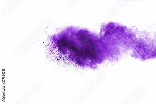 Abstract purple powder on white background. holi festival.