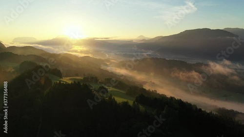 Drone flight over Tyrol landscape, at sunrise in Austria