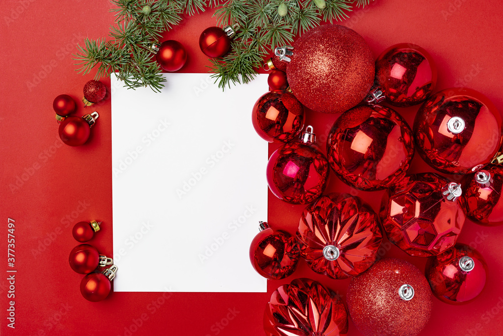 Red christmas baubles with blank page mock up for greeting card