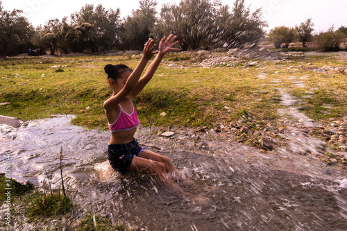  Girl splashing water