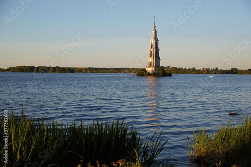 bell tower in the middle of the water