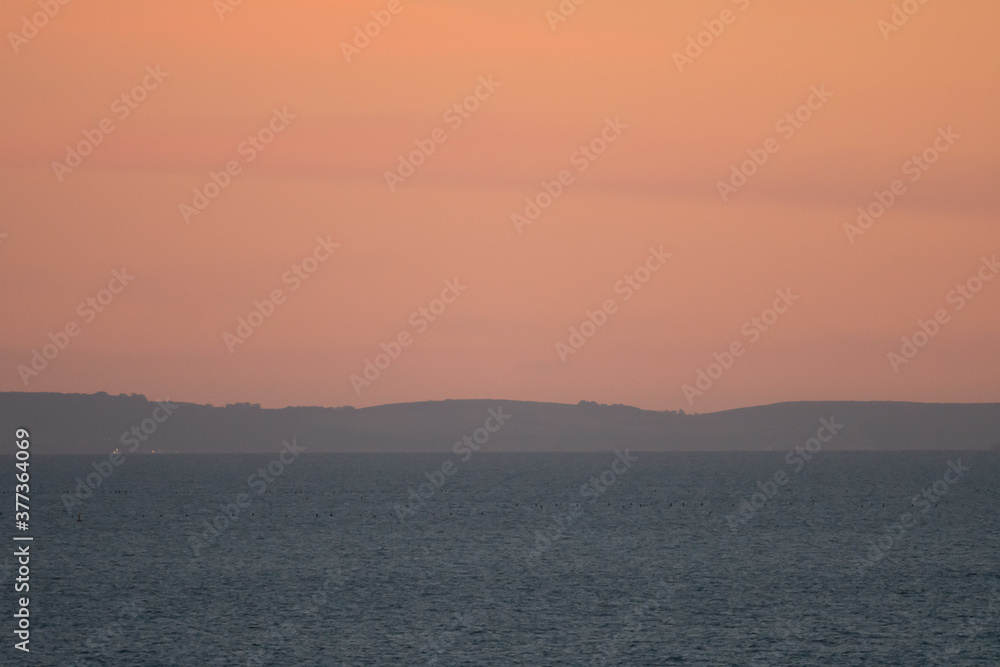 Hazy light at dusk on the coast of Devon Hazy light at dusk on the coast of Devon