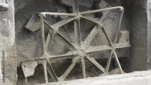 Detail of the construction site-mixing screw concrete mixer close-up photo