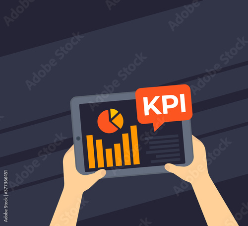 KPI and business analytics, key performance indicators, tablet in hands