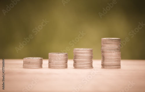 Stack of money coin with gold filter can be use as background