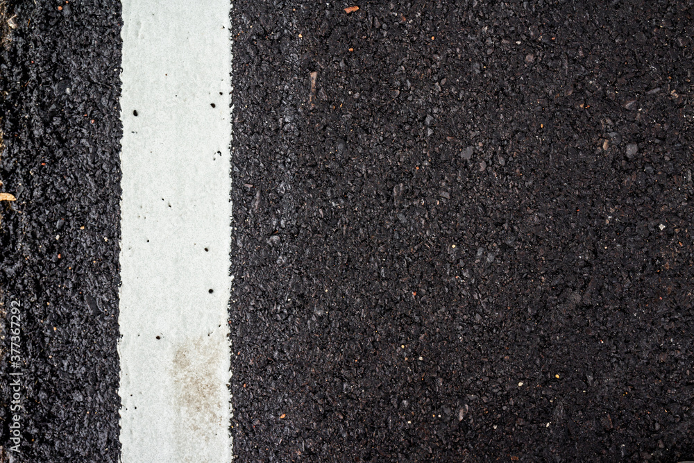 Fototapeta premium asphalt road with white line background