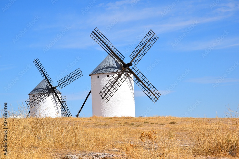Old windmills in Campo de Criptana, postcard photo.
