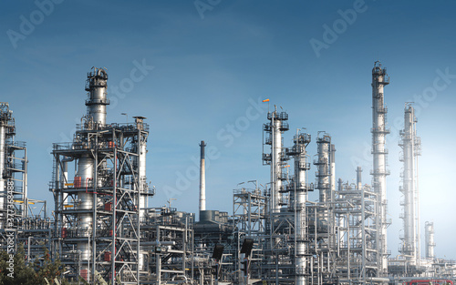 Petrochemical plant industry. Oil refinery industrial zone on sunset.