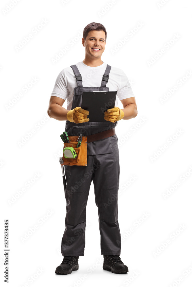 Full length portrait of a repairman with a tool belt holding a clipboard Full length portrait of a repairman with a tool belt holding a clipboard