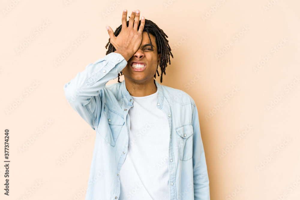 Young african american rasta man forgetting something, slapping forehead with palm and closing eyes. Young african american rasta man forgetting something, slapping forehead with palm and closing eyes.