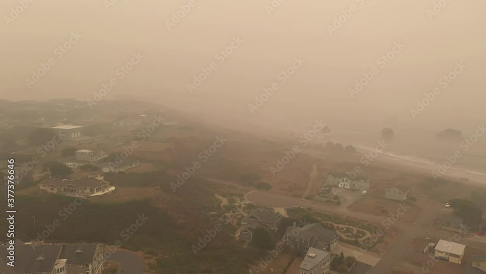 Aerial of Bandon Oregon during wildfire season 2020 with brown ash filled air Aerial of Bandon Oregon during wildfire season 2020 with brown ash filled air