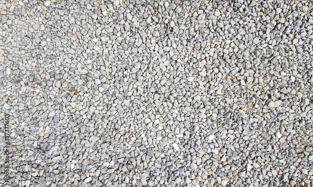 texture of gravel stones on ground background texture of gravel stones on ground background