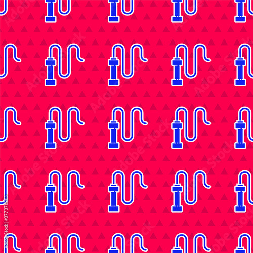 Blue Braided leather whip icon isolated seamless pattern on red background. Vector.