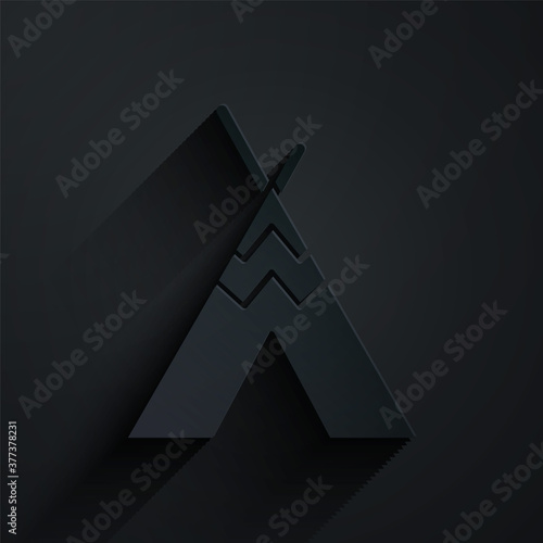 Paper cut Traditional indian teepee or wigwam icon isolated on black background. Indian tent. Paper art style. Vector.
