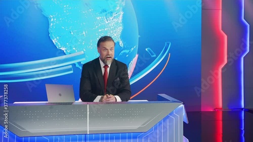 Live News Studio with Handsome Male Newscaster Reporting on the Events of the Day