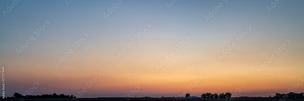 Fototapeta premium summer dawn in northern Colorado, panoramic web banner with a copy space