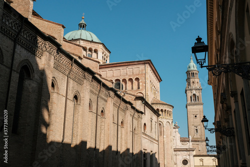 View of the San Giovanni Evangelista and Duomo across blue sky