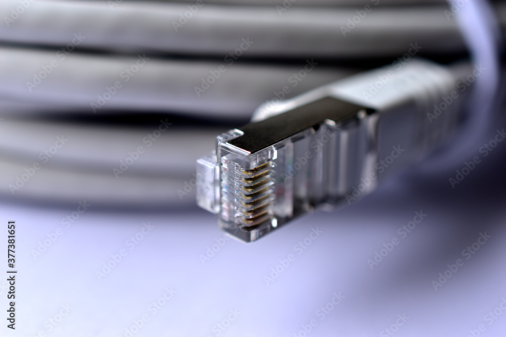 LAN cable patch cord white cord on white background LAN cable patch cord white cord on white background
