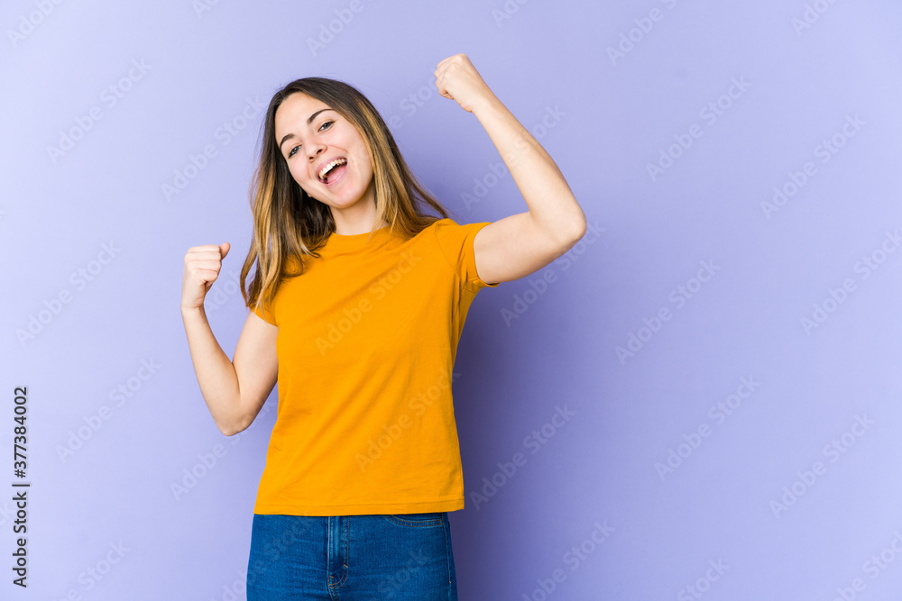 Young caucasian woman isolated on purple background cheering carefree and excited. Victory concept. Young caucasian woman isolated on purple background cheering carefree and excited. Victory concept.