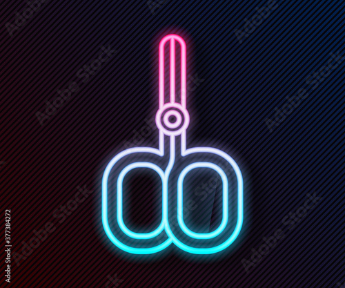 Glowing neon line Nail scissors cuticle cut beauty salon icon isolated on black background. Cosmetic scissors for manicure. Vector.