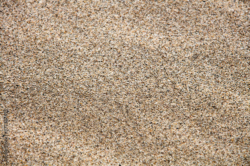 Close up sand texture on beach in summer. Sand background.