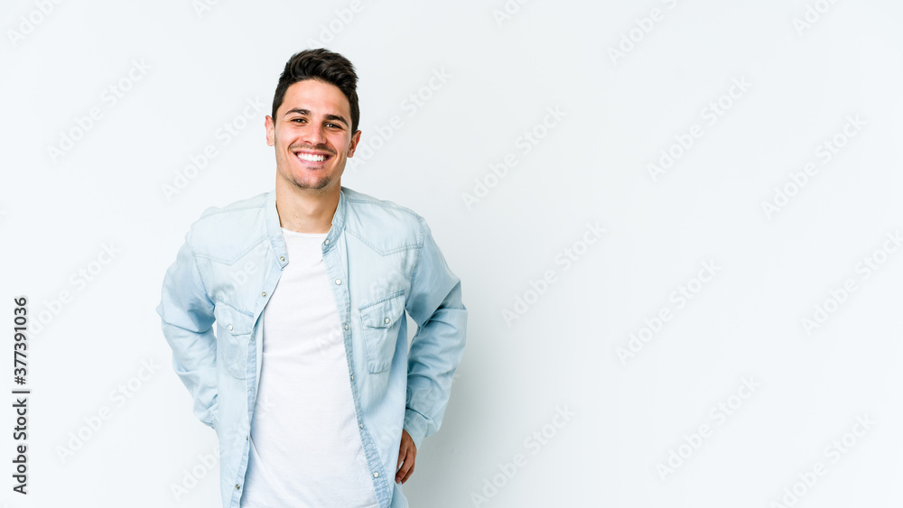 Young caucasian man isolated on white background happy, smiling and cheerful. Young caucasian man isolated on white background happy, smiling and cheerful.