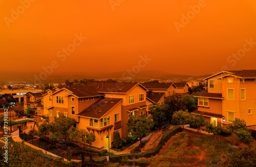 Orange haze over San Francisco on September 9 2020 from record wildfires in Californa, ash and smoke in the sky, daytime photo