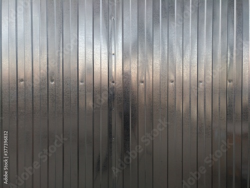 Vertical metal plates fences fencing in the city
