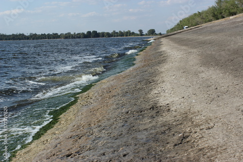 Concrete shore of the Kanevsky reservoir on the Dnieper river
