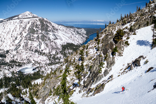 Mid forties man skiing down backcountry at Washington Pass photo