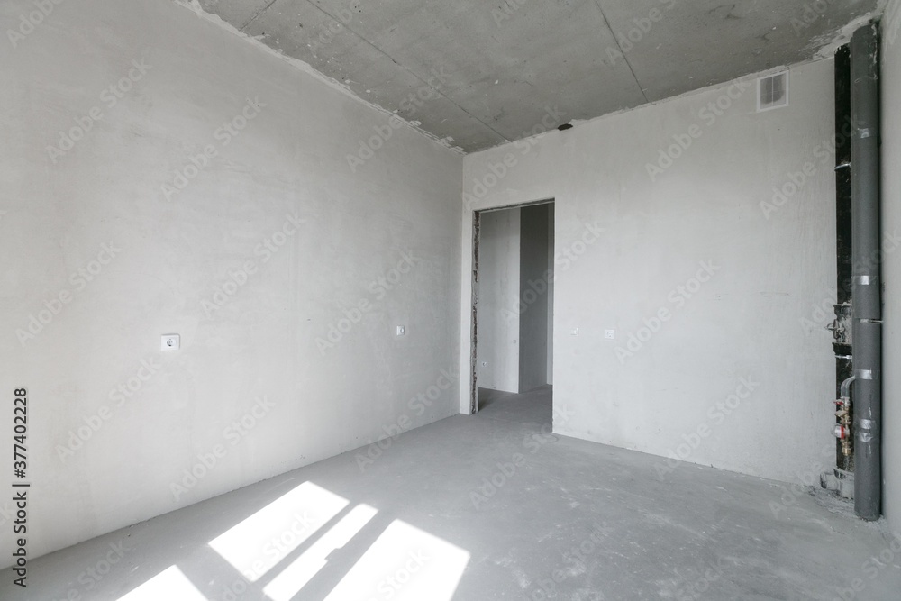 Obraz premium interior of the apartment without decoration in gray colors