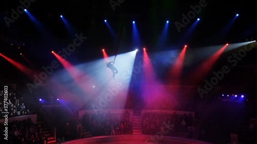 Aerialist on canvases in circus