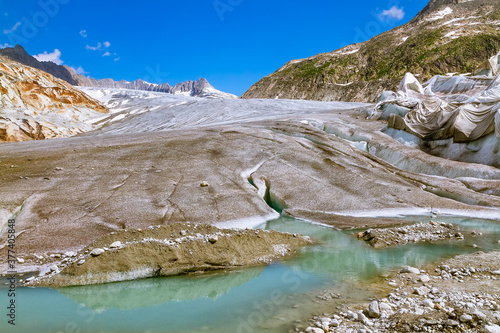 Switzerland, Furkapass July 2018: Melting Rhone Glacier in the Alps. Global warming in the Alps. Glacier melting.