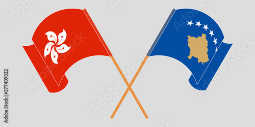 Crossed and waving flags of Kosovo and Hong Kong