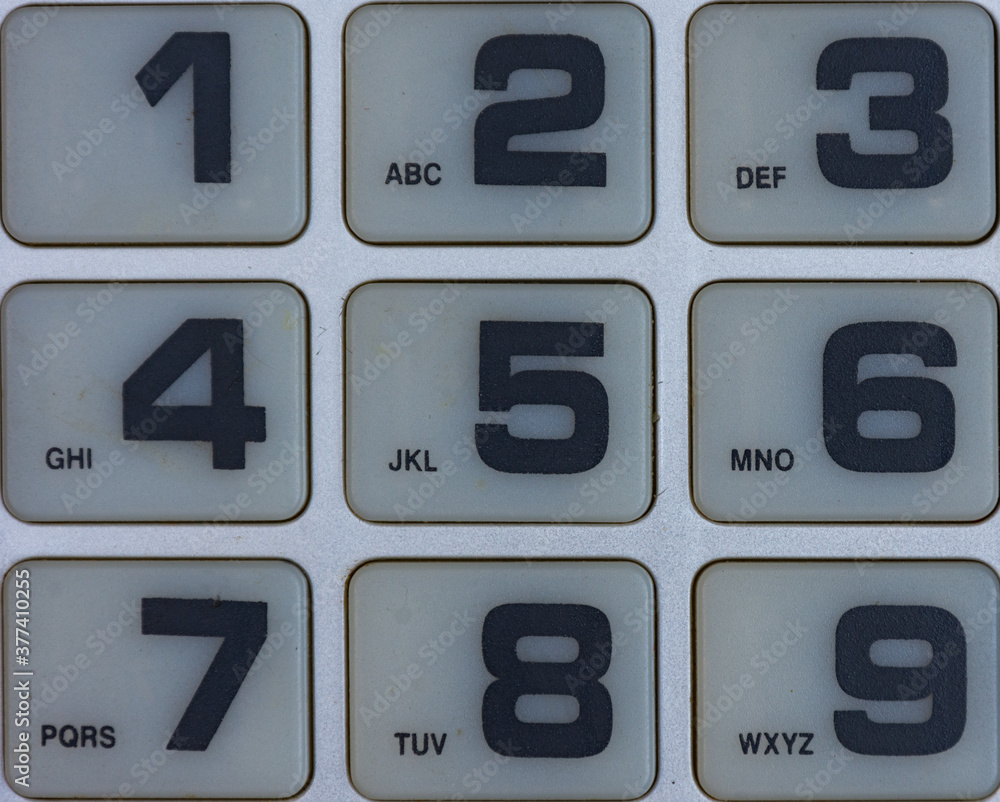 Close-up of a numeric keypad of an analog telephone