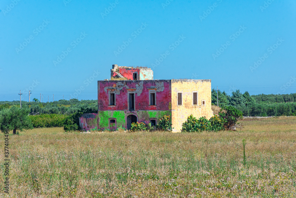 View of the countryside with land and abandoned cottage