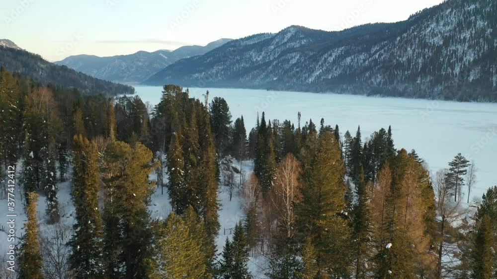 Aerial view frozen lake under snow. Aerial view frozen lake under snow.