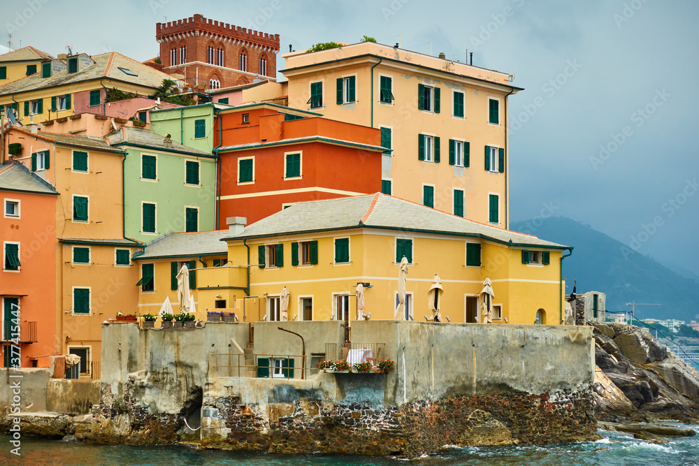 Old houses on the coast by the sea in Genoa