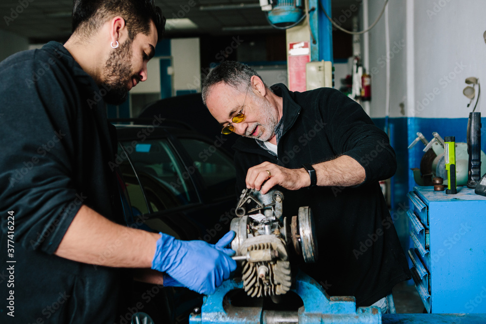 Two mechanics at work